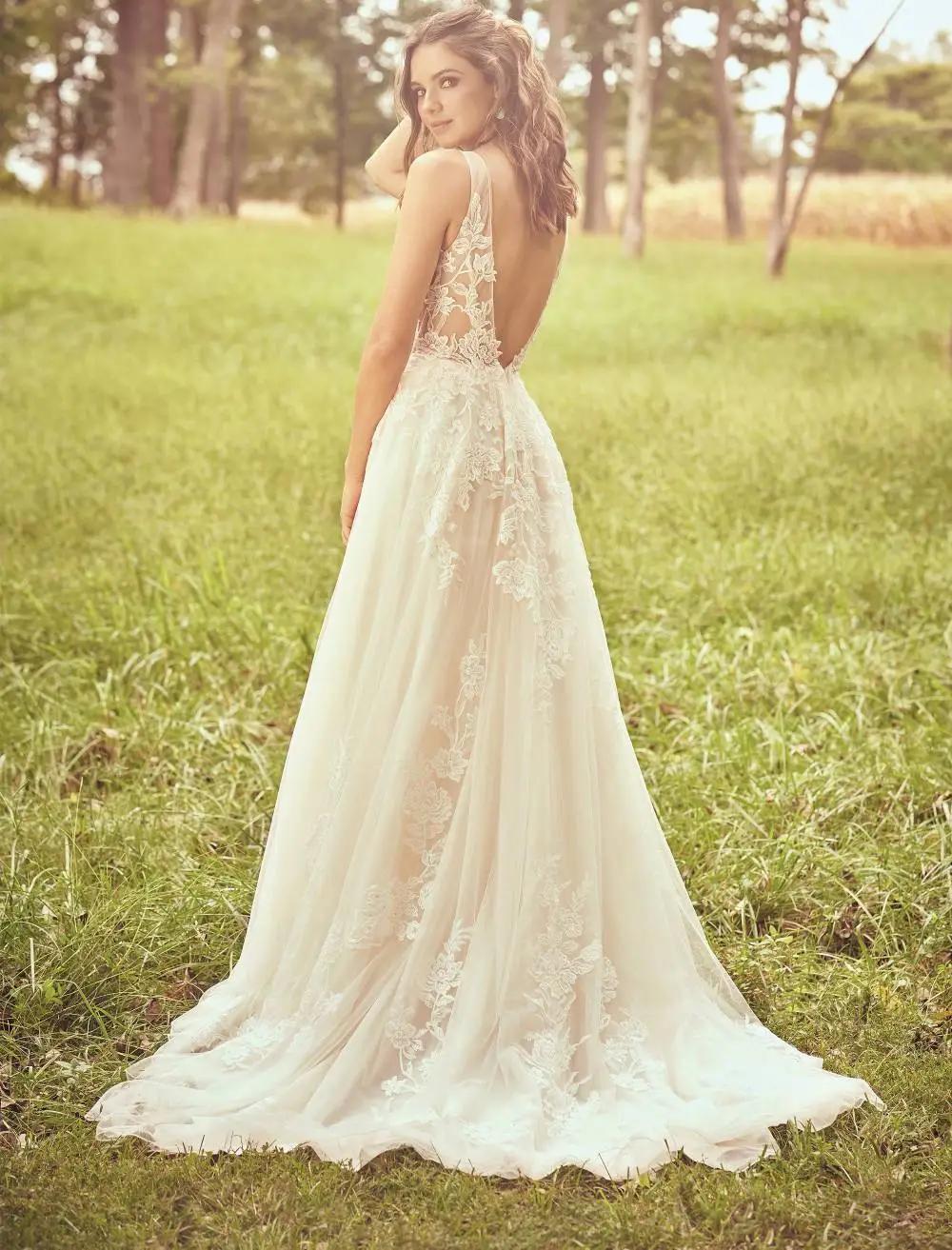 Exploring the Stunning Back Details Trend in Wedding Fashion Image